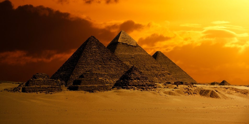 giza-pyramids-at-sunset-1692893742.jpg